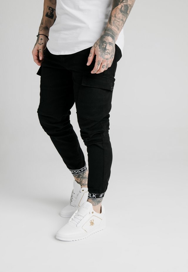 CUFF PANTS - Cargobyxor - black