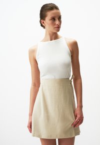 WITH HIGH WAIST TIES - Mini skirt - stoned