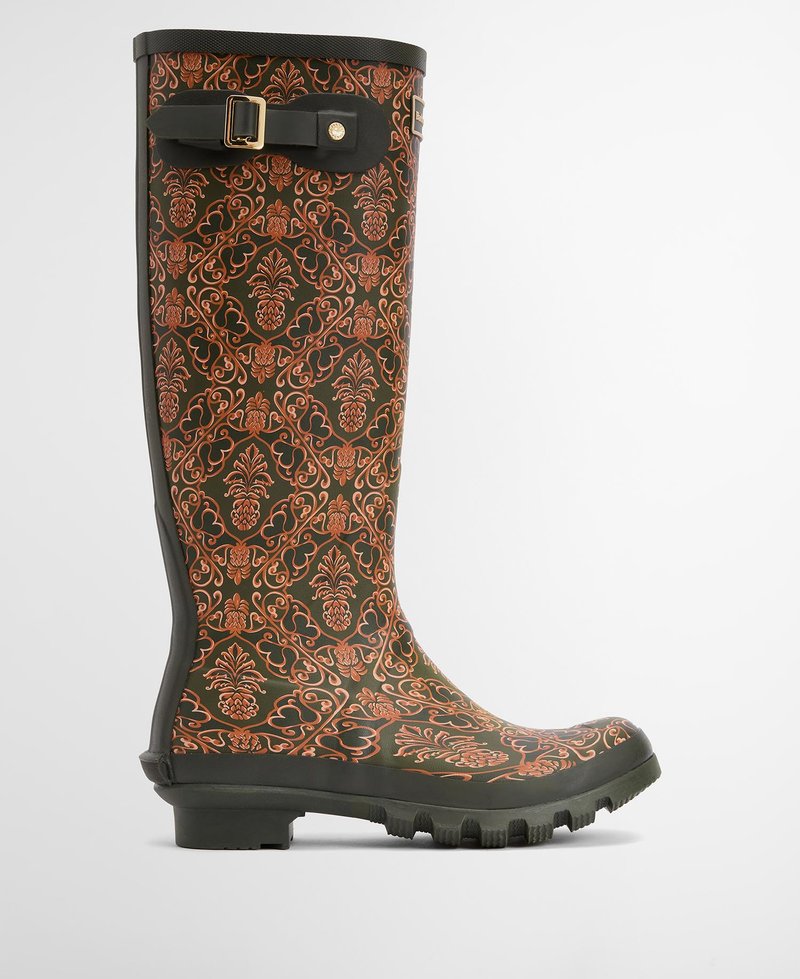 Tall rubber rain boot in dark green with intricate orange floral pattern. Features a buckle accent and textured sole for traction.