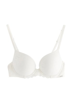 Bílá vycpávaná podprsenka s krajkovým proužkem, nastavitelnými ramínky a bezešvými košíčky. Hladká látka s měkkou texturou. Klasický design.