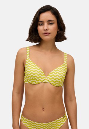 Sujetador de bikini con patrón de zigzag amarillo y blanco, con tirantes ajustables y un escote profundo, hecho de tejido elástico para mayor comodidad.