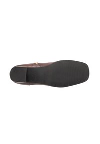 Brown leather shoe with a sleek design, rounded toe, subtle stitching detail, and a rubber outsole featuring a textured grip.
