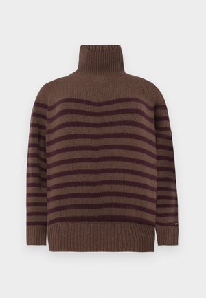 Brown turtleneck sweater with horizontal dark brown stripes. Ribbed texture at the collar and hem. Loose fit allows for comfortable wear.