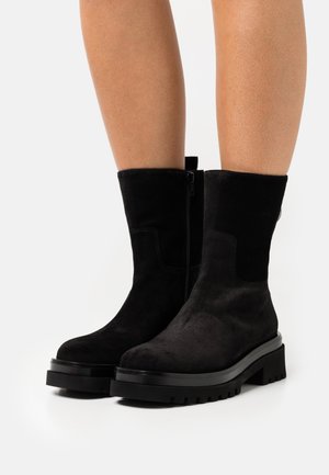 GOLVA - Platform ankle boots - black