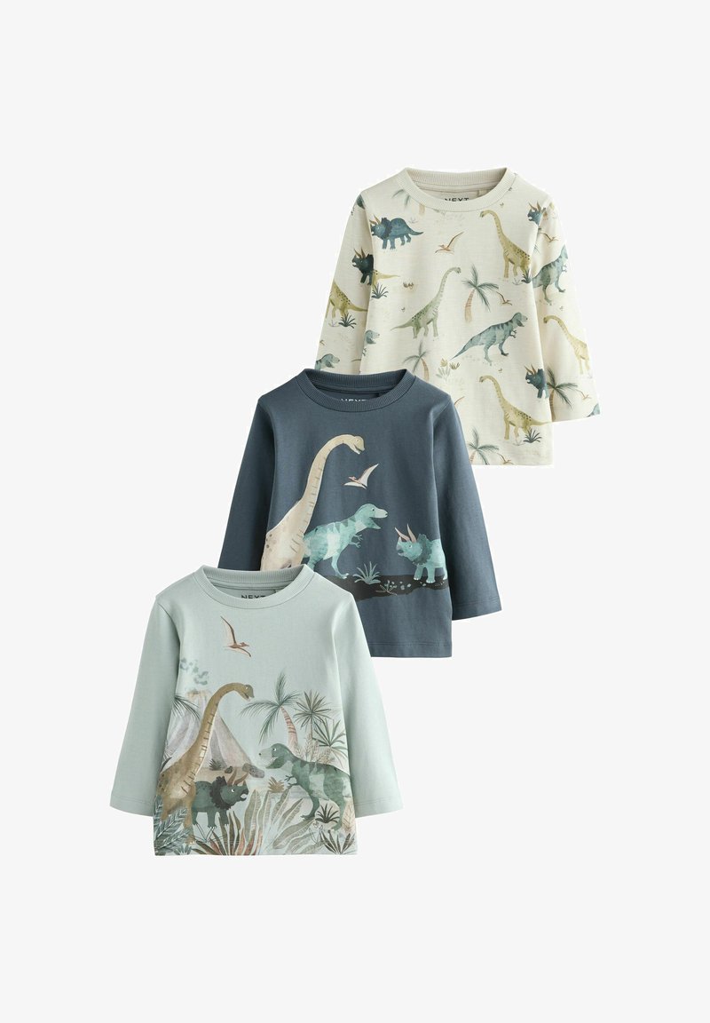 Drei langärmelige Baumwoll-T-Shirts in Pastellfarben. Mit Dinosaurier-Illustrationen, Palmblättern und unterschiedlichen Designs auf jedem Shirt.