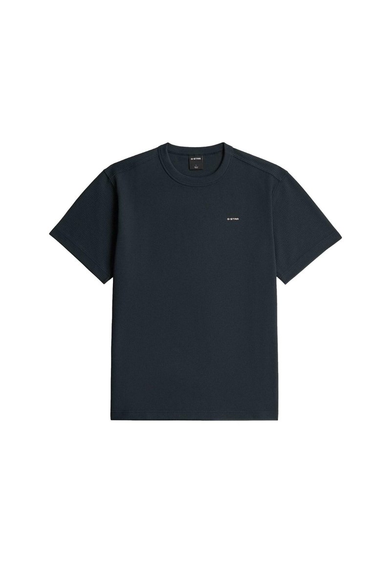Camiseta de manga corta azul marino con cuello redondo, tejido sutilmente texturizado y un pequeño logo blanco "G-STAR" en el pecho izquierdo.