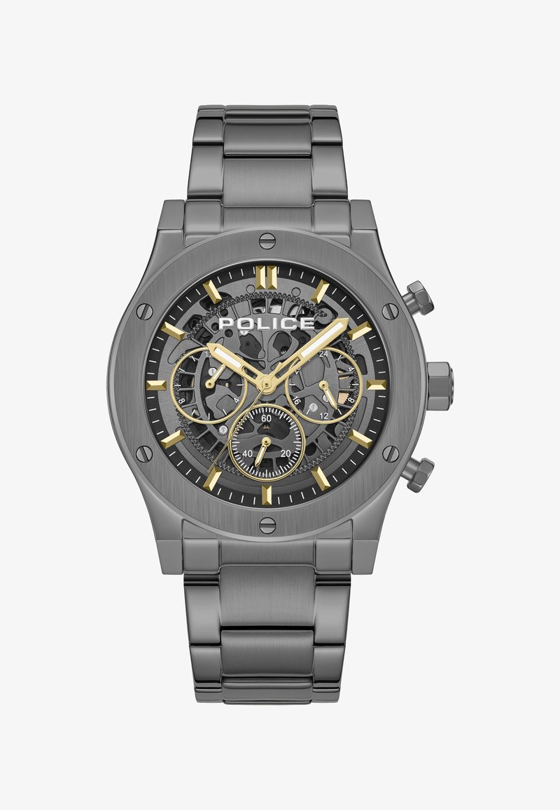 Orologio in acciaio inossidabile grigio con quadrante trasparente nero, dettagli in oro e sotto-quadranti del cronografo, accompagnato da un bracciale in metallo spazzolato.