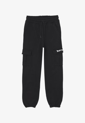 Pantaloni cargo neri in felpa con cintura elastica, cordoncino, tasche laterali e testo bianco sulla patta della tasca cargo destra, polsini elastici alle caviglie.