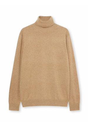 Pull à col roulé beige en tricot doux. Dispose de manches longues et d'un col haut ajusté. Design sans coutures avec des poignets côtelés.