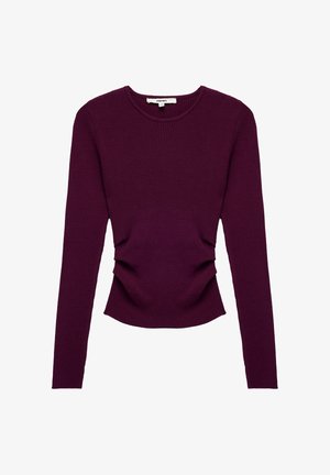Top de manga larga de canalé en púrpura oscuro, con detalles fruncidos en los laterales y un escote redondo. Fabricado con una suave tela texturizada.