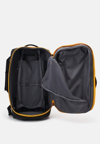 The North Face BASE CAMP ROLLING THUNDER 28 UNISEX - Trolley - summit gold/black