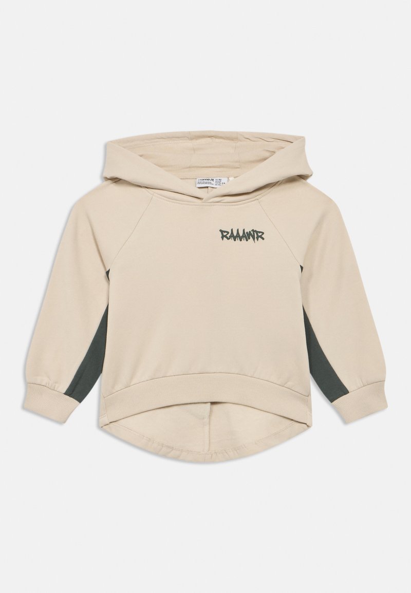 Μπεζ φούτερ για νήπια με σκούρες πλευρικές πινελιές, μακριά μανίκια, κουκούλα μπροστά και την επιγραφή "RAAAWR" στο στήθος με σκούρα γράμματα.