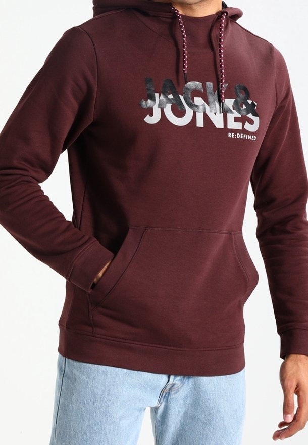 Felpa bordeaux con tasca frontale, cappuccio con lacci e stampa grafica "JACK & JONES RE:DEFINED" in colori a contrasto. Tessuto misto cotone.