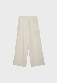 Pantalon en lin beige à jambes larges, coupe ample et taille élastique, présenté sur un fond clair uni.