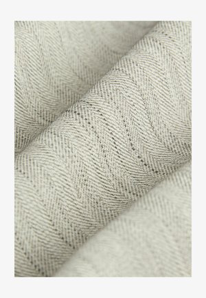 Textile featuring a light gray, herringbone pattern with a textured weave. Soft fibers create a subtle depth in design and color.