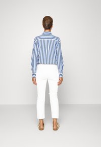 GAP Vaqueros slim fit - white