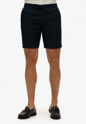 Pantalones cortos de lino azul marino con cintura elástica y cordón. Presentan un corte relajado y dos bolsillos laterales.