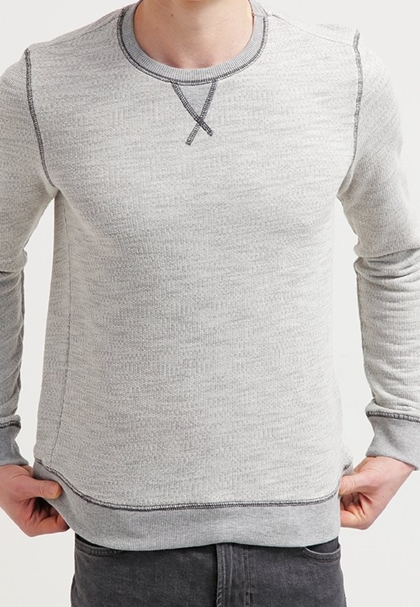 Sweat-shirt gris à manches longues en tissu texturé avec des coutures contrastantes le long des coutures et un col rond.