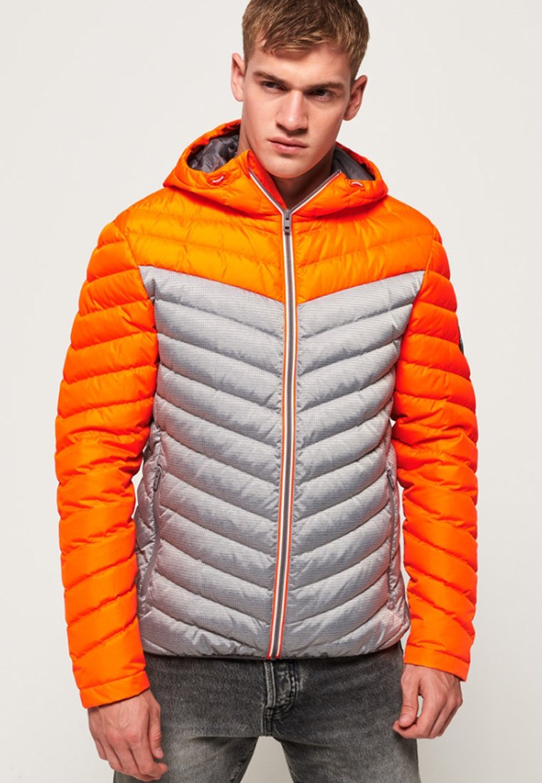 grey and orange jacket