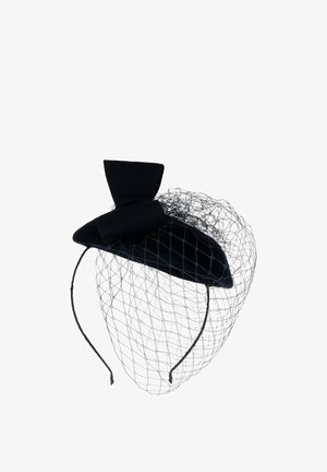 Black velvet fascinator hat with bow detail and attached black mesh veil on a thin headband.