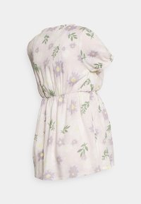Blomstertrykk topp med pastellfiolette og grønne farger, korte ermer, elastisk midje og en myk, lett stofftekstur.