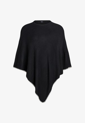 Schwarzer Poncho aus weichem Stoff, mit rundem Halsauschnitt und dekorativem weißen Saum entlang der Kanten, in einer lockeren, fließenden Form.