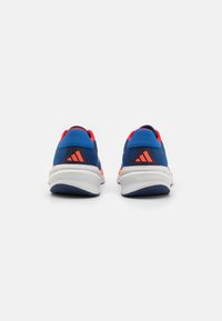 adidas Performance SUPERNOVA STRIDE - Road running shoes - blue/footwear white/team royal blue