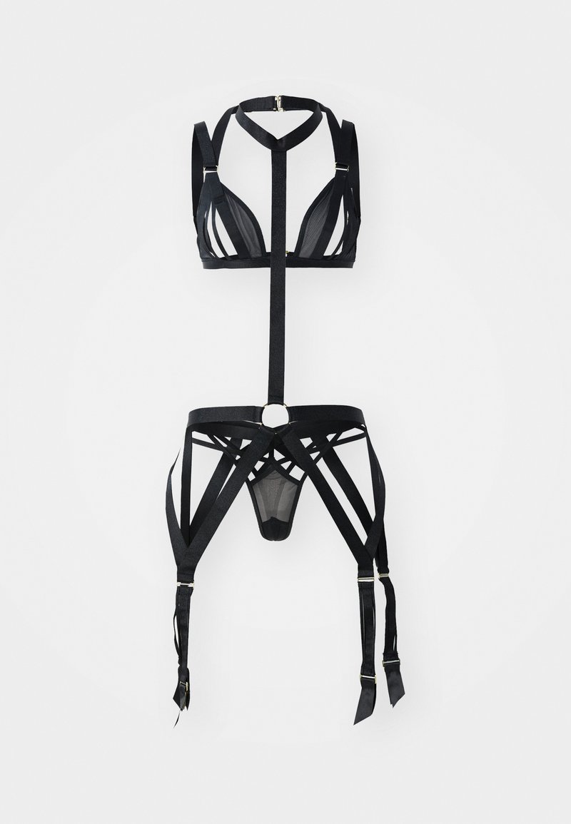 Black harness lingerie set featuring a triangular bra, adjustable straps, and a matching garter belt with cut-out details and gold accents.
