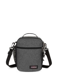 Piccola borsa a tracolla grigia realizzata in tessuto, con chiusura a zip, tracolla regolabile, manico superiore e una tasca laterale in rete. Presenta il logo EASTPAK.