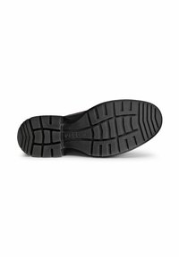 Black rubber shoe sole featuring a patterned tread design with grooves for traction. Clear logo visible on the side.