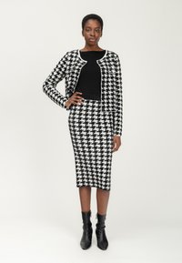 INFLUENCER Kokerrok - milk