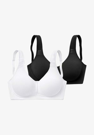 Twee draadloze beha's in wit en zwart. Beide hebben een gladde, naadloze uitstraling en verstelbare bandjes voor een gepersonaliseerde pasvorm.