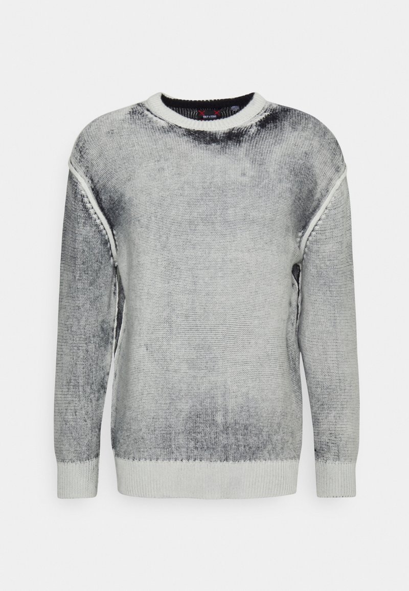Pull en maille à manches longues avec un motif noir et blanc délavé et des bords-côtes aux poignets, à l’ourlet et au col.