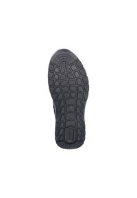 Semelle de chaussure en caoutchouc noir avec un motif texturé, présentant des rainures profondes et des contours pour la traction et le soutien.