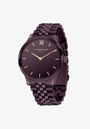 Mørk lilla metal armbåndsur med en glat urskive, rosaguld timeindikatorer og et kædearmbåndsdesign. Har et fremtrædende romersk tal XII.