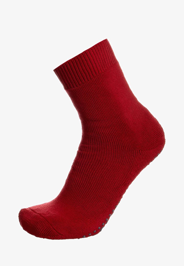 Calzino rosso alla caviglia realizzato in tessuto liscio con parte superiore a coste. Presenta un fondo texturizzato per una migliore aderenza, con una punta senza cuciture.