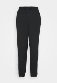 Pantaloni jogger neri realizzati in un tessuto morbido, con vita elastica e cordino, e strisce bianche sui lati. Design semplice e vestibilità affusolata.