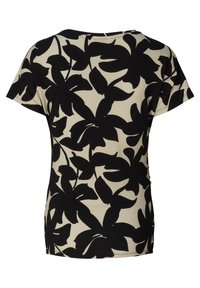 Zwart bloemenpatroon top op een beige achtergrond, korte mouwen en een relaxte pasvorm. Zachte stof met een gladde textuur.