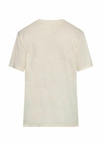 T-shirt in cotone beige chiaro con maniche corte, scollatura a girocollo e superficie leggermente texturizzata. Colore semplice e uniforme, senza motivi o dettagli.