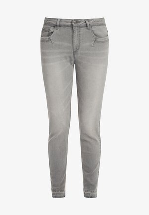 Jeans skinny en denim gris avec un design classique à cinq poches, fermeture par bouton et zipper, texture lisse et décoloration subtile.