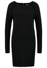 Abito nero a maniche lunghe con scollatura rotonda e zip sul retro. Realizzato in tessuto liscio, presenta maniche raglan e una silhouette aderente.