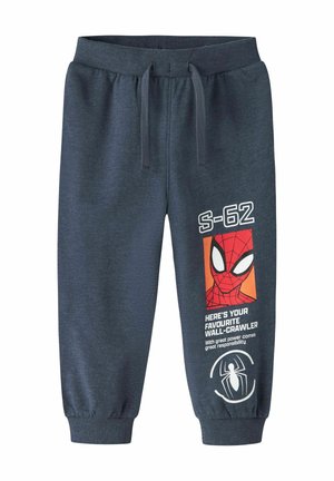 Pantalon de survêtement enfant bleu foncé avec motif visage de Spider-Man, motif toile d'araignée, texte et emblème d’araignée sur la jambe droite. Taille et chevilles élastiquées.