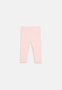 Rosa ribbede leggings med en myk tekstur, med en tettsittende fasong og en elastisk midje, designet for komfort og bevegelsesfrihet.