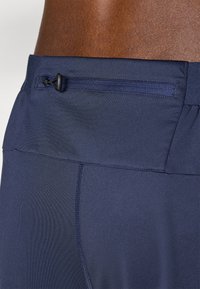 ASICS LITE-SHOW PANT - Outdoor trousers - midnight