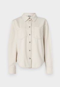 Beige denimskjorte med lange ermer, knapper foran, to brystlommer og klassisk krage. Myk tekstur med avrundet kantdetalj.