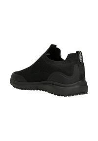 Black slip-on shoe featuring a knitted upper and a rubber sole with textured accents. Includes a pull tab at the heel for easy wear.