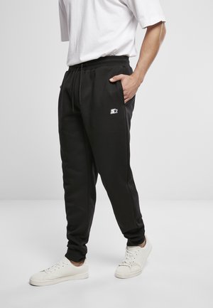 ESSENTIAL  - Tracksuit bottoms - black