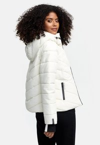 White puffer jacket with a hood, featuring horizontal quilting, black zipper accents, and logo detail on the sleeve. Smooth, shiny finish.