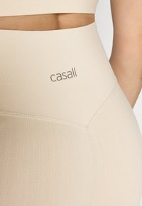 Casall SEAMLESS HIGH WAIST  - Tajice - ecru