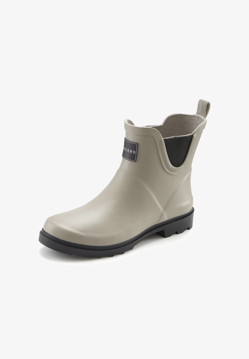 Light gray rubber ankle rain boot with a black sole, elastic side panels, and a pull tab for easy wear. Flat, rounded toe design.